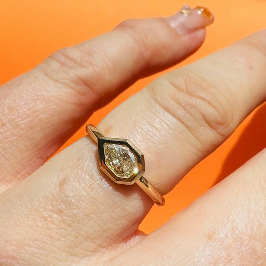 Modified Pear Shaped Diamond Frame Solitaire