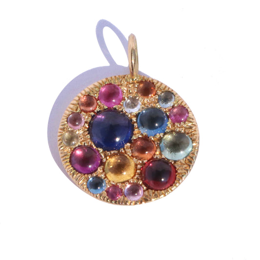 Jelly Bean Sapphire disc pendant on white background