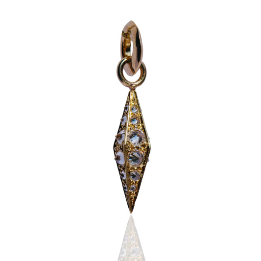 barbed diamond obelisk pendant against a white background