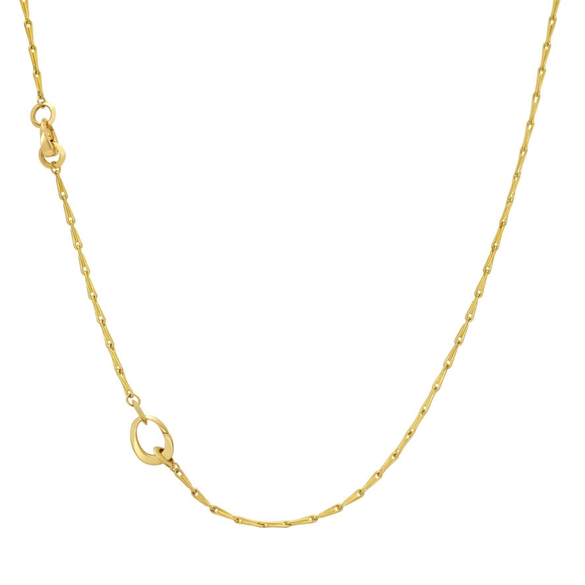 A convertible gold "puzzle chain" in yellow gold,  featuring a small polished oval clip link accent,  and larger oval clip link, with 2" extender chain, displayed against a solid white background.