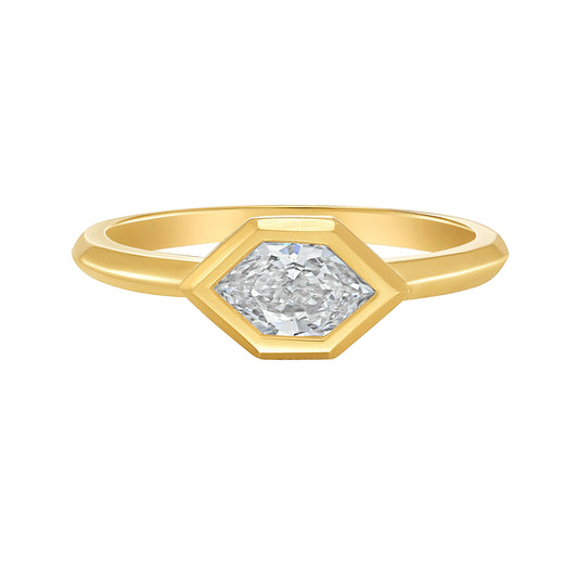 Gold bezel set ring with a Duchess cut white diamond on a white background by Tamsin Rasor