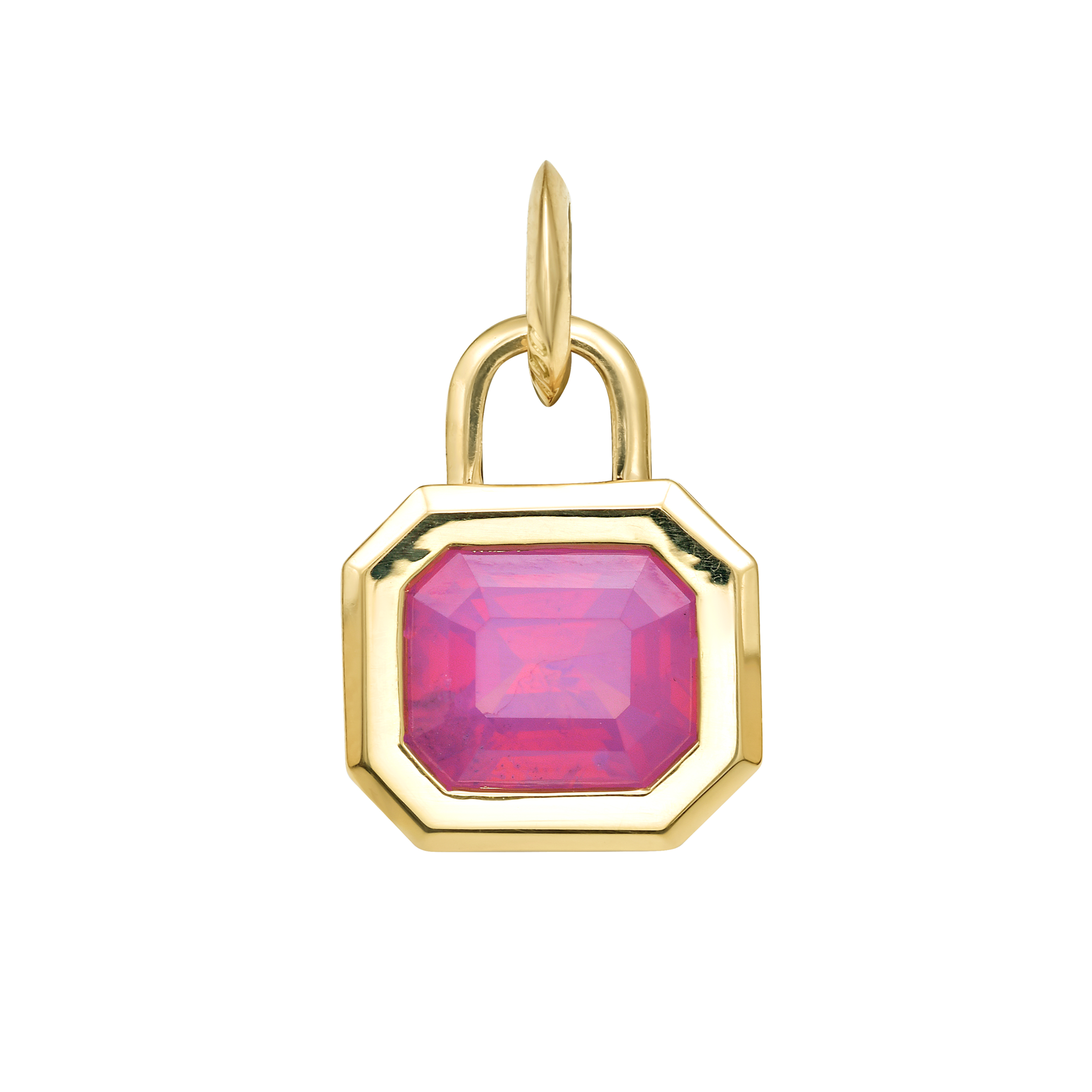 Bezel set octagonal pink spinel and 18K gold charm on white background  by Tamsin Rasor.
