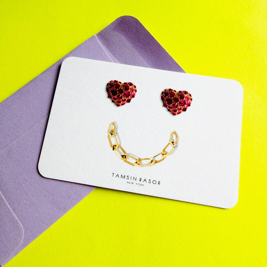 Tamsin Rasor Gift Card with purple envelope on neon yellow background