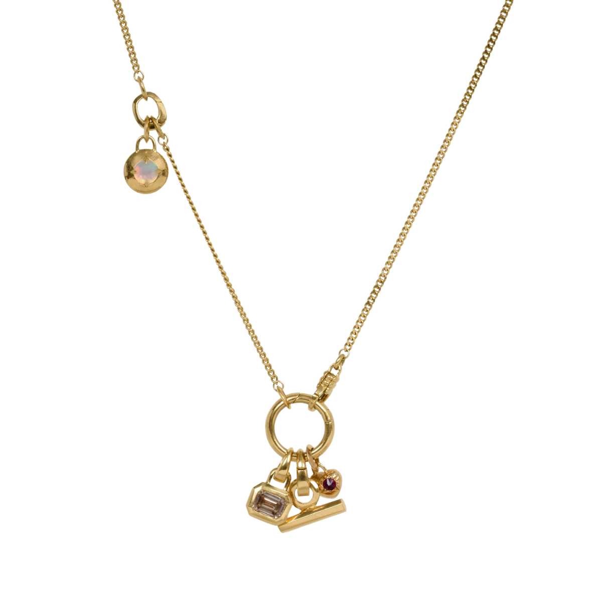 Convertible four piece chain. 1.75 mm width, 18K curb chain lengthe in 16" and 2" long with two removable clip bails. Total chain length approx 20" shown with additional charms and pendants (sold separately) on white background