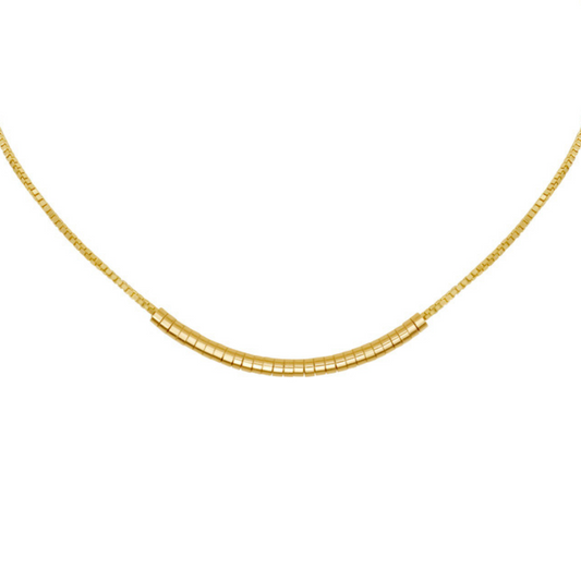 Gold sliding worry bead chain by Tamsin Rasor against white background