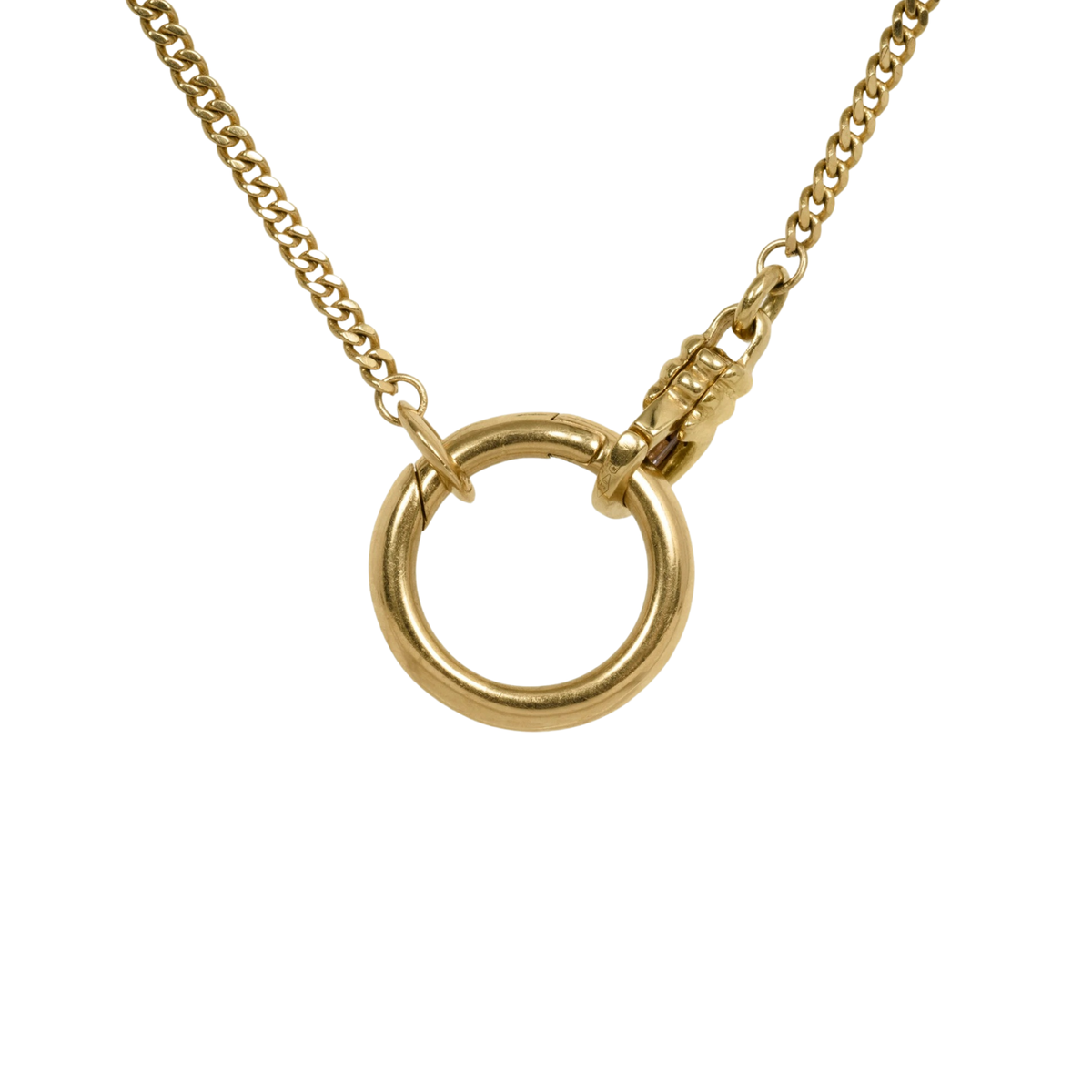 close up of round clip bail holding two lengths of chain together on white background