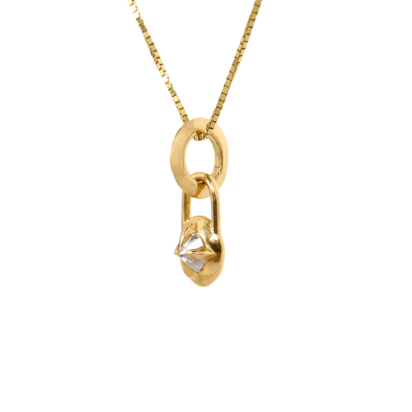 Mini gold and diamond compass necklace on white background , from the side by Tamsin Rasor