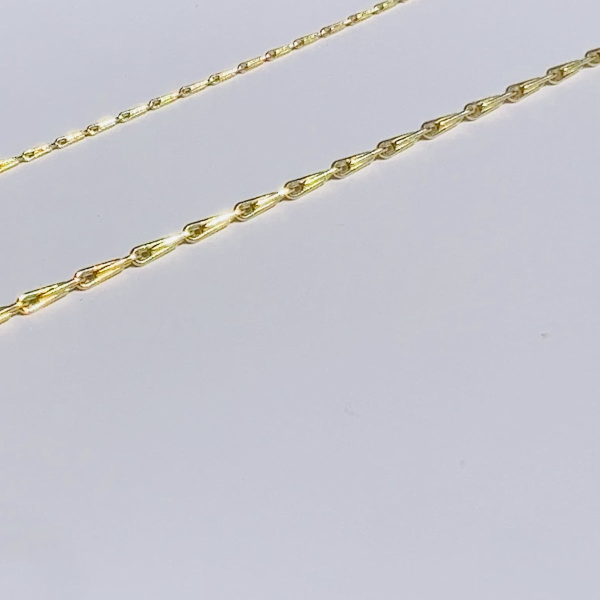 Video of gold barley corn chain in 1mm and 1.7mm widths on a white background by Tamsin Rasor Fine Jewelry