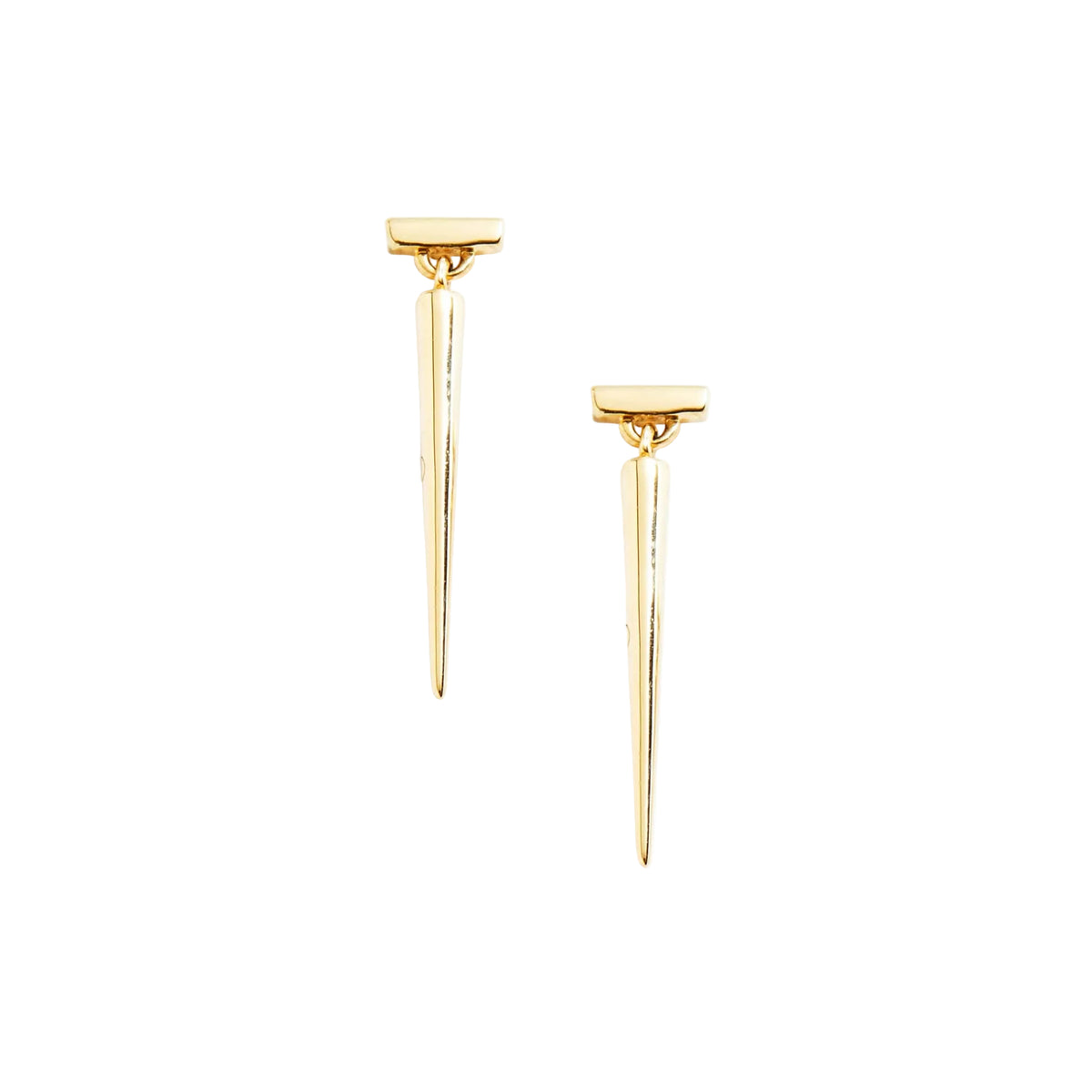 Gold spike earrings on a white background by Tamsin Rasor